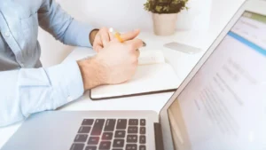 Chiropractic biller reviewing iontophoresis treatment notes for a CPT 97033 claim